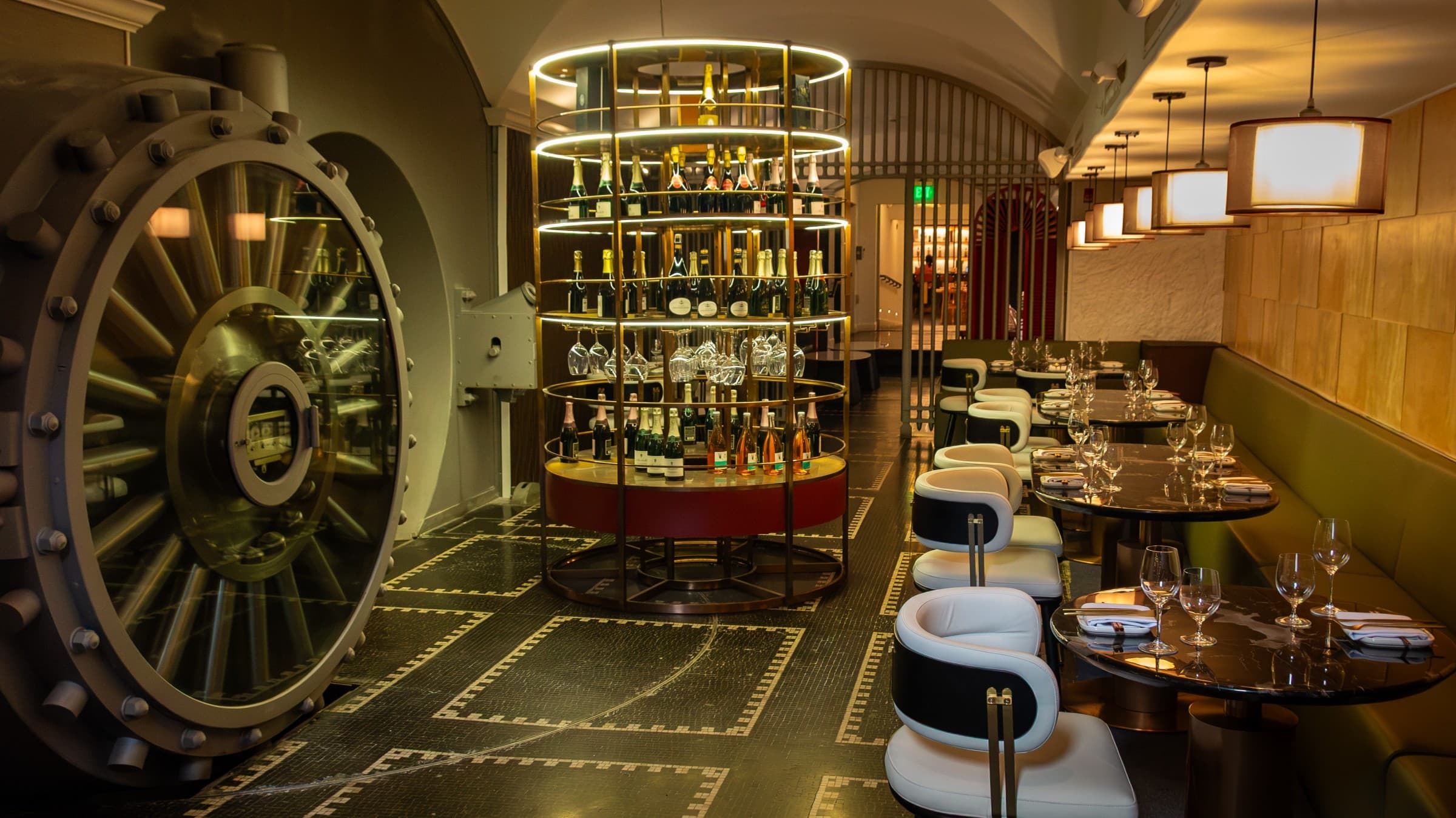 The original bank vault door and dining room at The Vault Japanese Chophouse